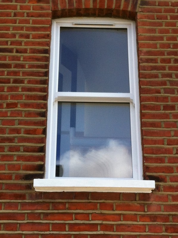 uPVC sash window on Victorian red brick house in Dunstable